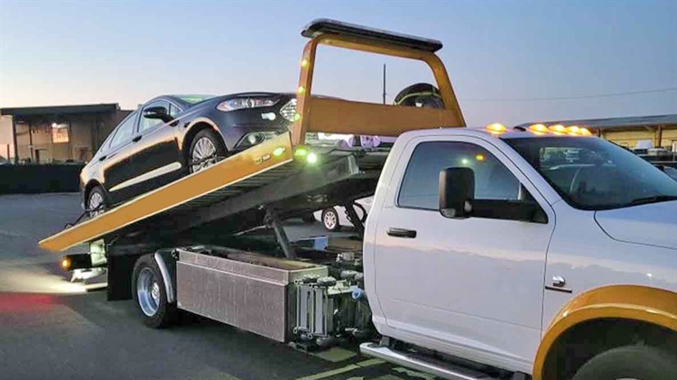 EV towing Ottawa flatbed transport for electric vehicles